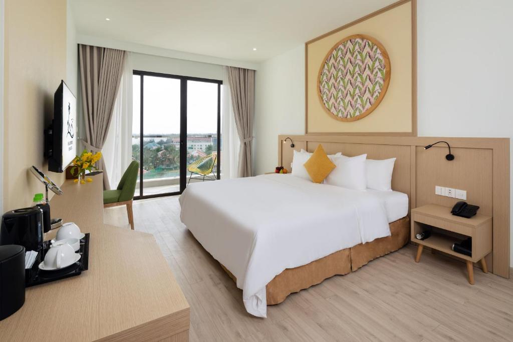 Двухместный (Улучшенный двухместный номер с 1 кроватью или 2 отдельными кроватями) отеля Hoan My Resort - Phan Rang, Фанранг