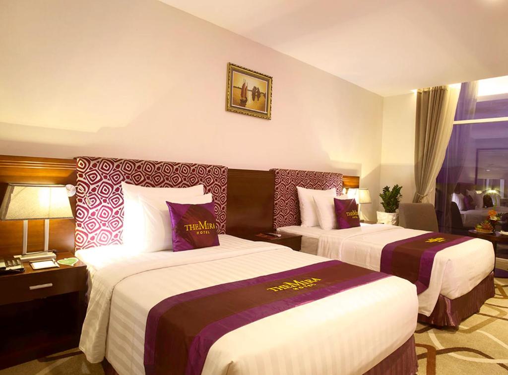 Двухместный (Улучшенный двухместный номер с 2 отдельными кроватями) отеля The Mira Hotel, Хошимин