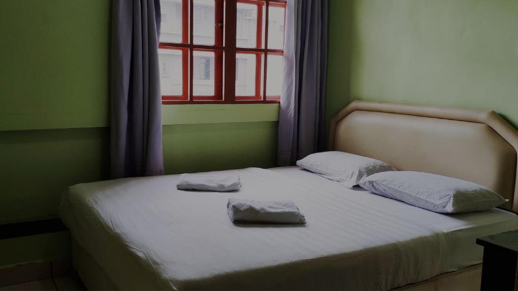 Двухместный (Двухместный номер с 1 кроватью и собственной ванной комнатой) хостела Borneo Gaya Lodge, Кота-Кинабалу