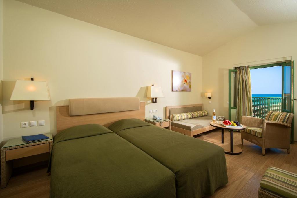 Двухместный (Двухместный номер с 1 кроватью или 2 отдельными кроватями, вид на сад) курортного отеля Silva Beach Hotel, Херсониссос