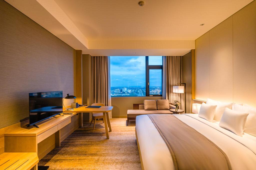 Двухместный (Люкс с 2 отдельными кроватями) отеля Hotel Nikko Hai Phong, Хайфон