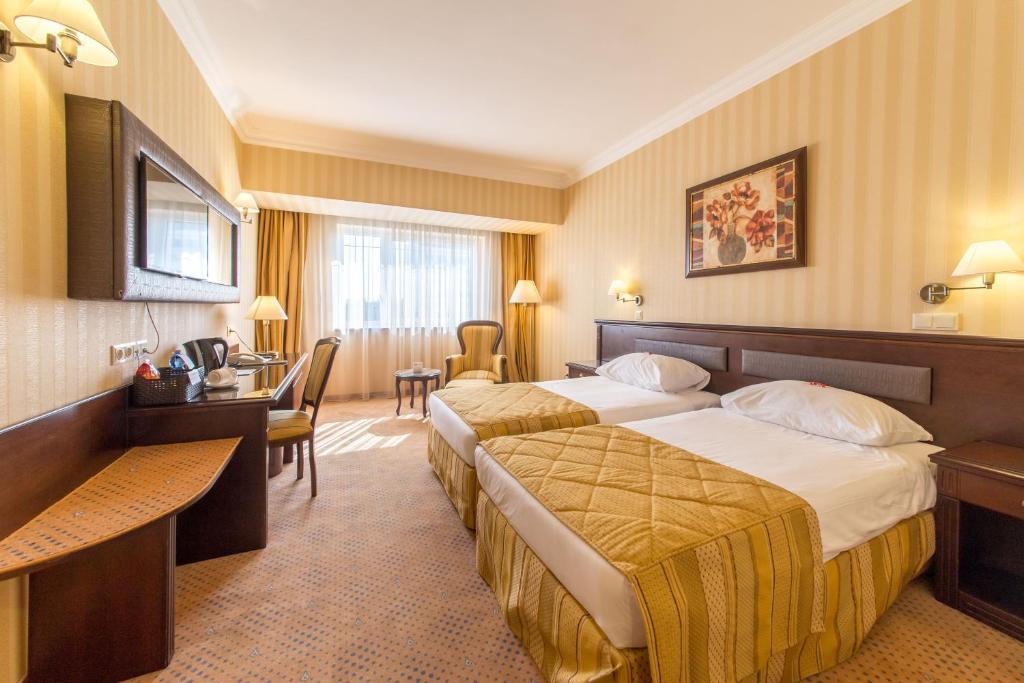 Двухместный (Номер Делюкс с 2 отдельными кроватями - Для некурящих) отеля Ramada Hotel & Suites Bucharest North, Бухарест