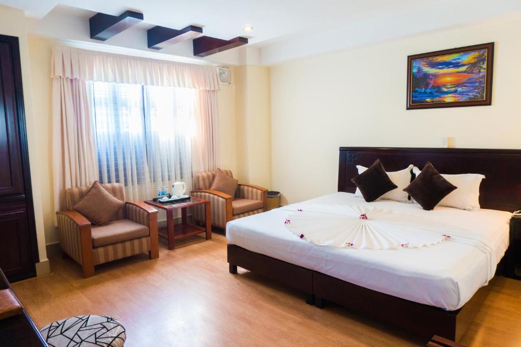 Двухместный (Двухместный номер Делюкс с 1 кроватью или 2 отдельными кроватями) отеля The Summer Hotel, Нячанг
