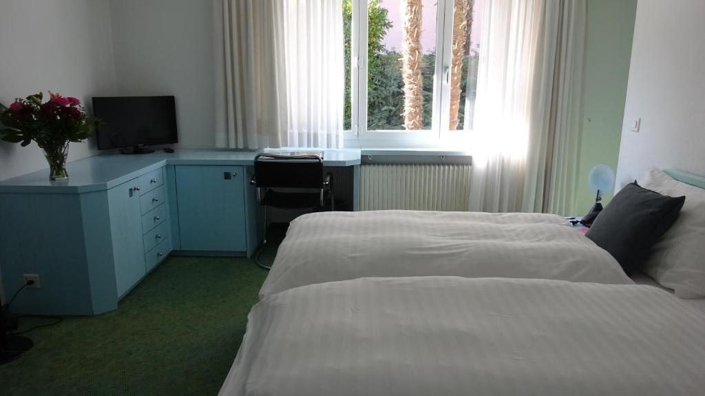 Семейный (Семейный номер с 2 спальнями - Дополнительное здание) отеля Albergo Gardenia, Лугано