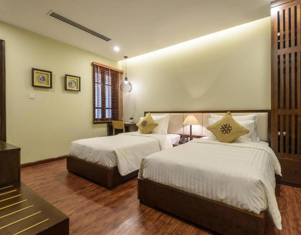 Двухместный (Двухместный номер Делюкс с 1 кроватью или 2 отдельными кроватями) отеля Emerald Hotel, Ханой