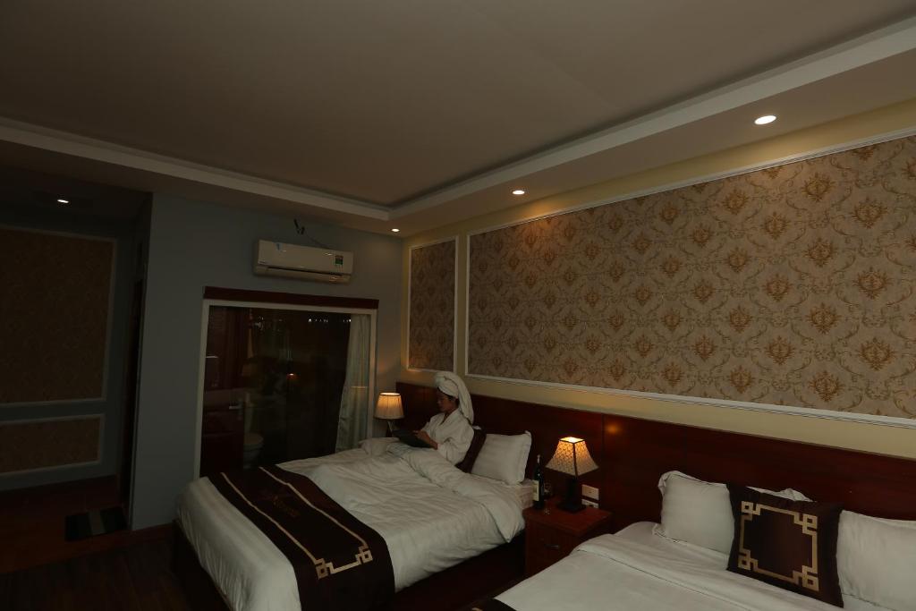 Двухместный (Улучшенный двухместный номер с 2 отдельными кроватями) отеля Sapa Unique Hotel, Сапа