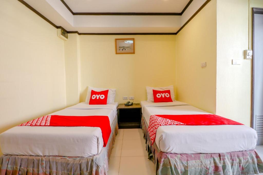 Двухместный (Просторный двухместный номер с 2 отдельными кроватями) отеля Win Long Place, Бангкок