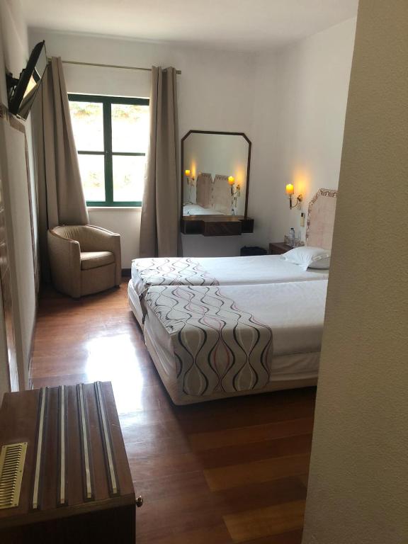 Двухместный (Стандартный двухместный номер с 2 отдельными кроватями) отеля Hotel Castelo de Vide, Марвао