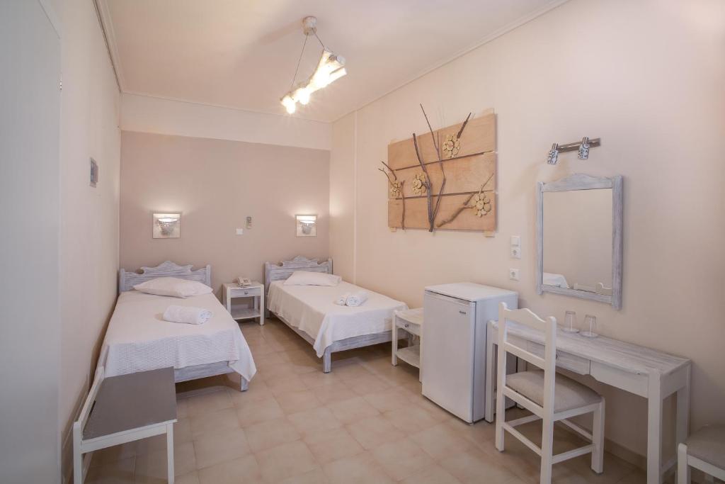 Двухместный (Двухместный номер с 2 отдельными кроватями - Подходит для гостей с ограниченными физическими возможностями) отеля Amaryllis Hotel, Перисса