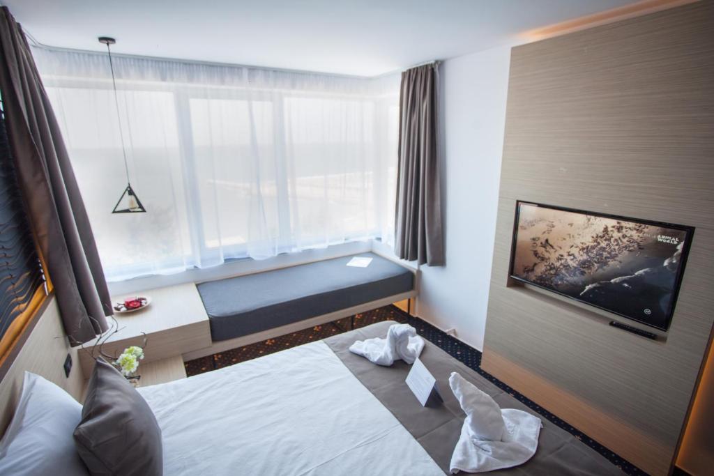Двухместный (Двухместный номер Делюкс с 1 кроватью и видом на море) отеля Aqvatonic Hotel - Steaua de Mare, Эфорие-Норд