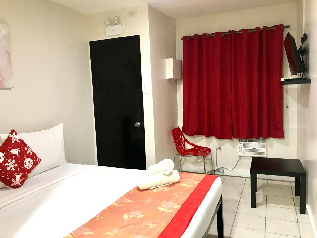 Двухместный (Двухместный номер с 1 кроватью и террасой) хостела HalfWay House Hostel Mactan Cebu Airport, Мактан