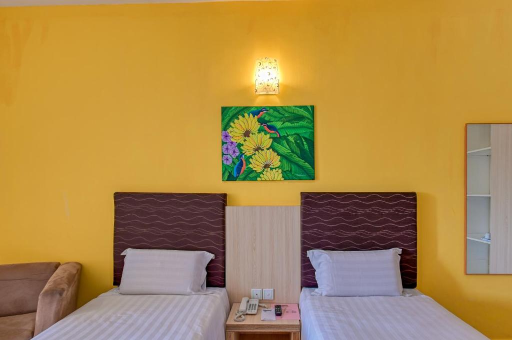 Двухместный (Улучшенный двухместный номер с 1 кроватью или 2 отдельными кроватями) отеля Geopark Hotel Kuah Langkawi, Лангкави