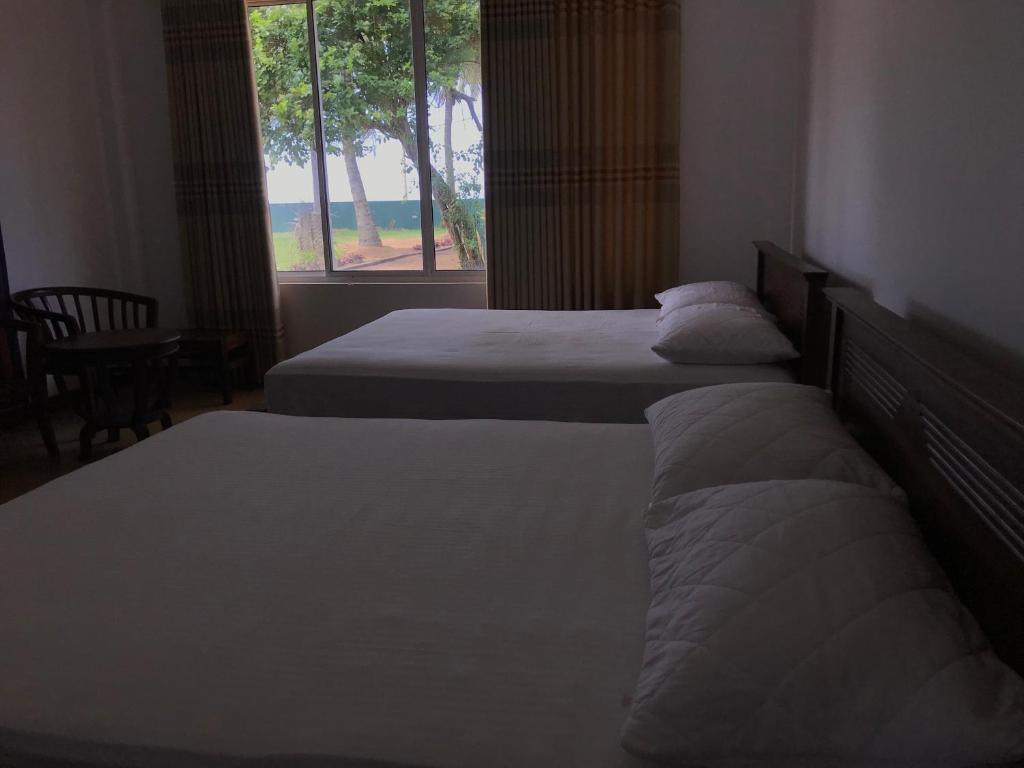 Семейный (Семейный номер с видом на море) семейного отеля Villa Whispering Shells, Калутара