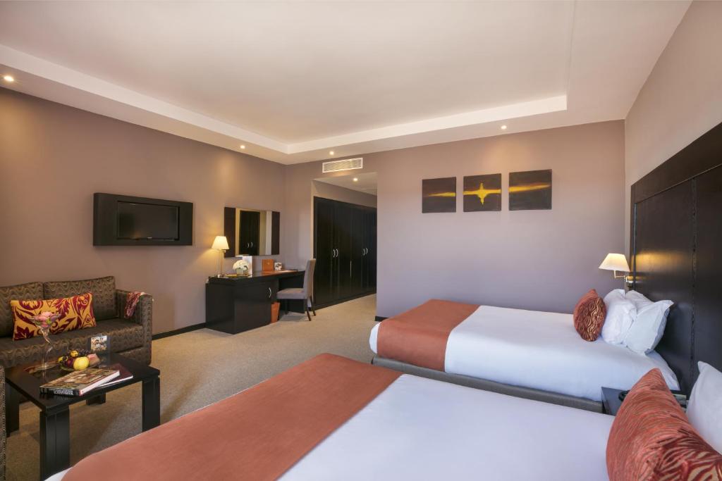 Двухместный (Двухместный номер Делюкс с 2 двуспальными кроватями) отеля Kech Boutique Hotel & Spa, Марракеш