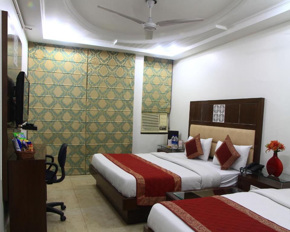Трехместный (Трехместный номер Делюкс) отеля Hotel Sita International, Нью-Дели