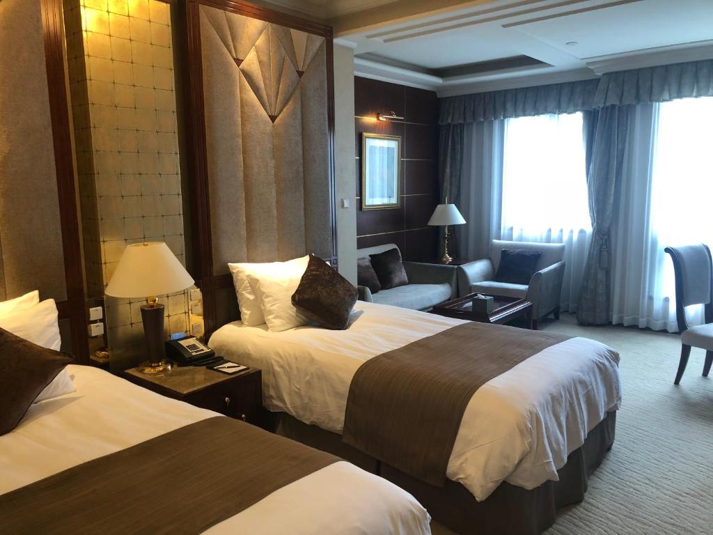 Двухместный (Двухместный номер бизнес-класса с 2 отдельными кроватями) отеля Xijiao State Guest Hotel, Шанхай