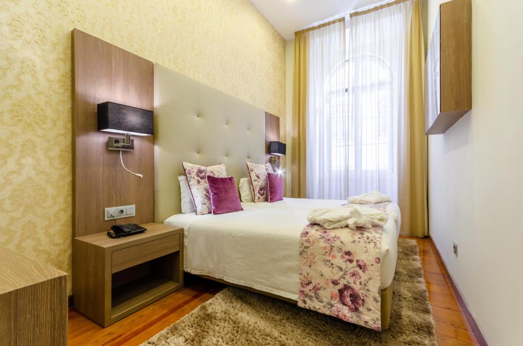 Двухместный (Улучшенный двухместный номер с 1 кроватью) отеля Hotel INN Rossio, Лиссабон