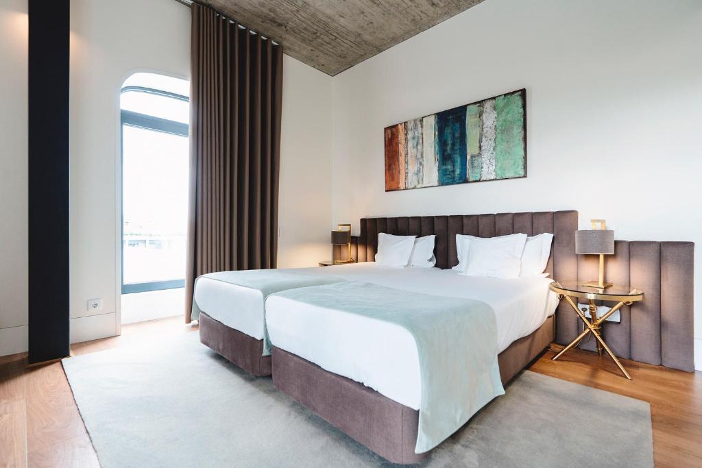 Двухместный (Двухместный номер Делюкс с 1 кроватью или 2 отдельными кроватями, вид на горы) отеля Borralha Guest House, Вила-Реал