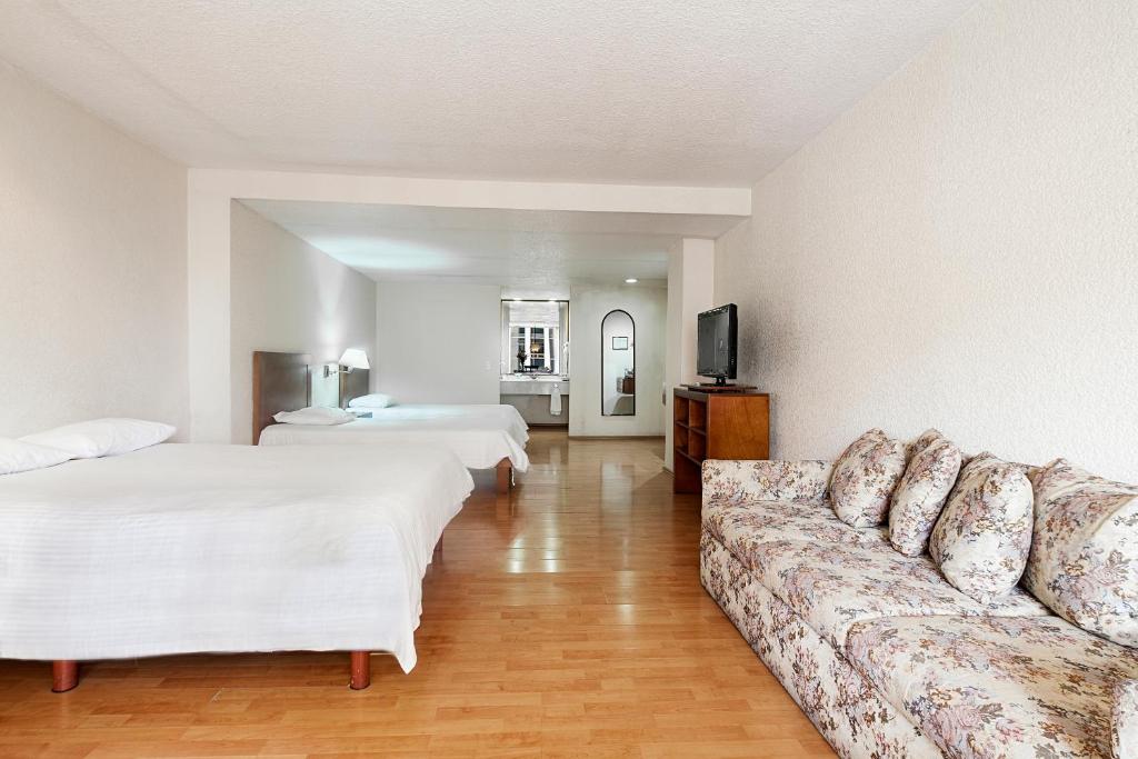 Трехместный (Трехместный номер) апарт-отеля Exe Suites San Marino, Мехико