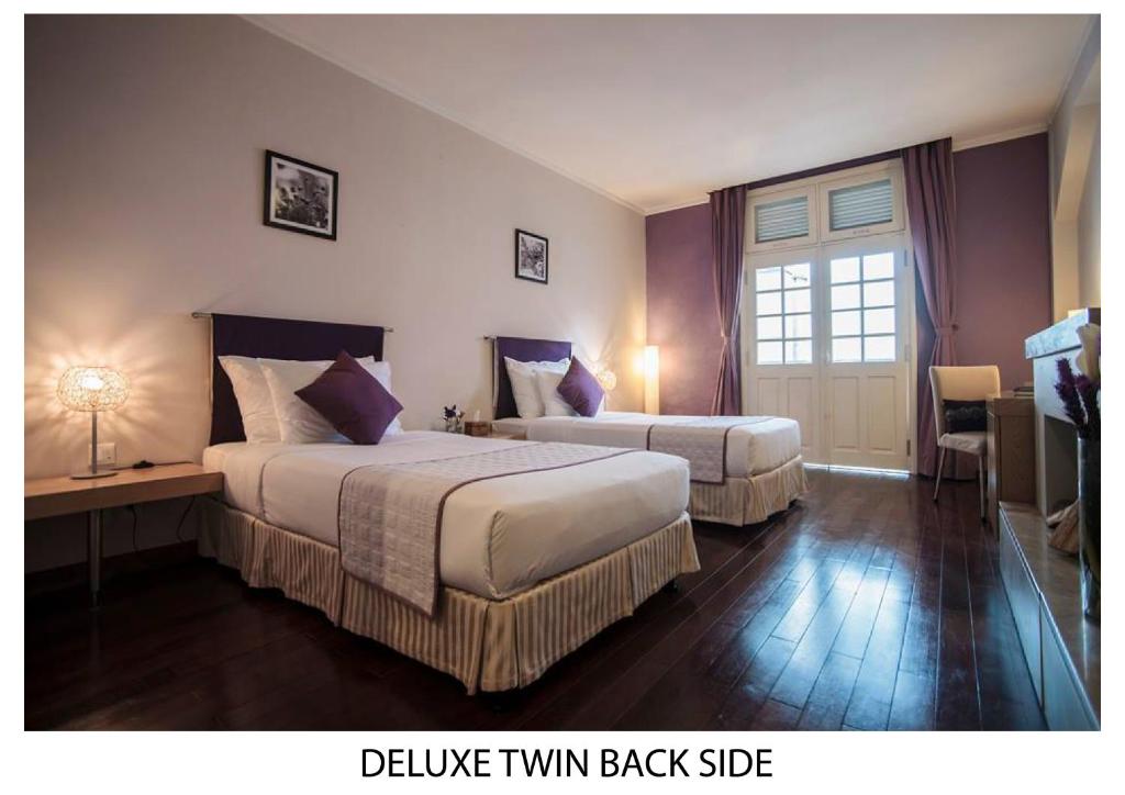 Двухместный (Двухместный номер Делюкс с 2 отдельными кроватями) отеля TTC Hotel Premium Ngoc Lan, Далат
