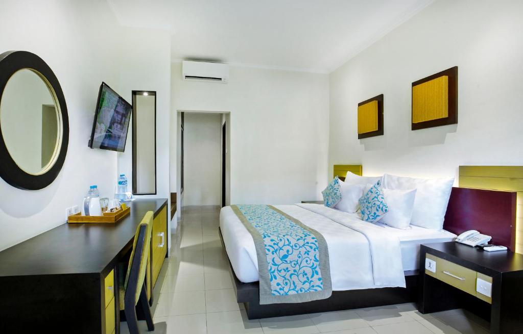 Двухместный (Специальное предложение - Улучшенный двухместный номер с 1 кроватью или 2 отдельными кроватями) отеля Adhi Jaya Hotel, Кута