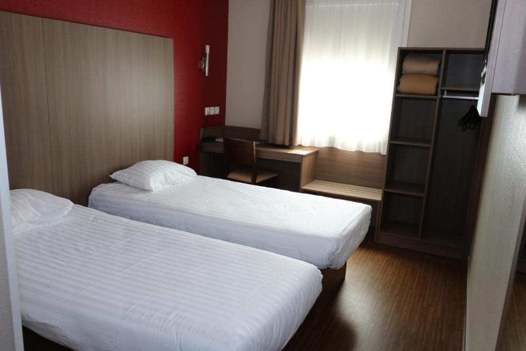 Двухместный (Двухместный номер с 2 отдельными кроватями) отеля Hotel Arena Bordeaux Sud - Gradignan - Talence, Бордо