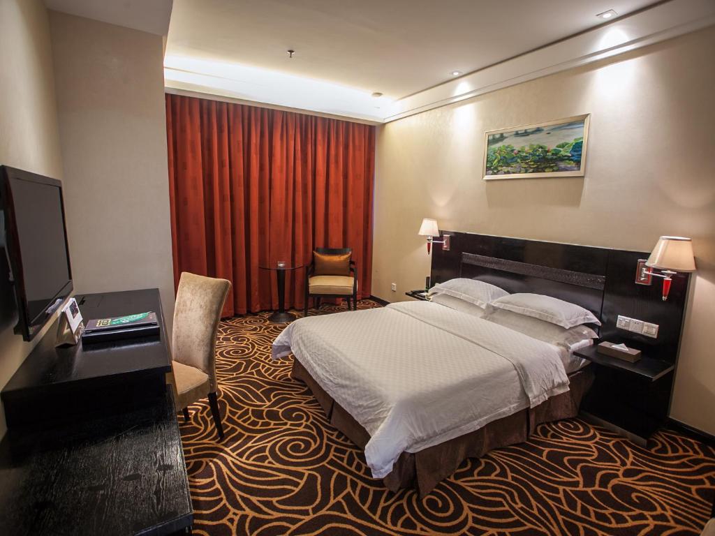 Двухместный (Улучшенный двухместный номер с 1 кроватью) отеля Hua Shi Hotel, Гуанчжоу
