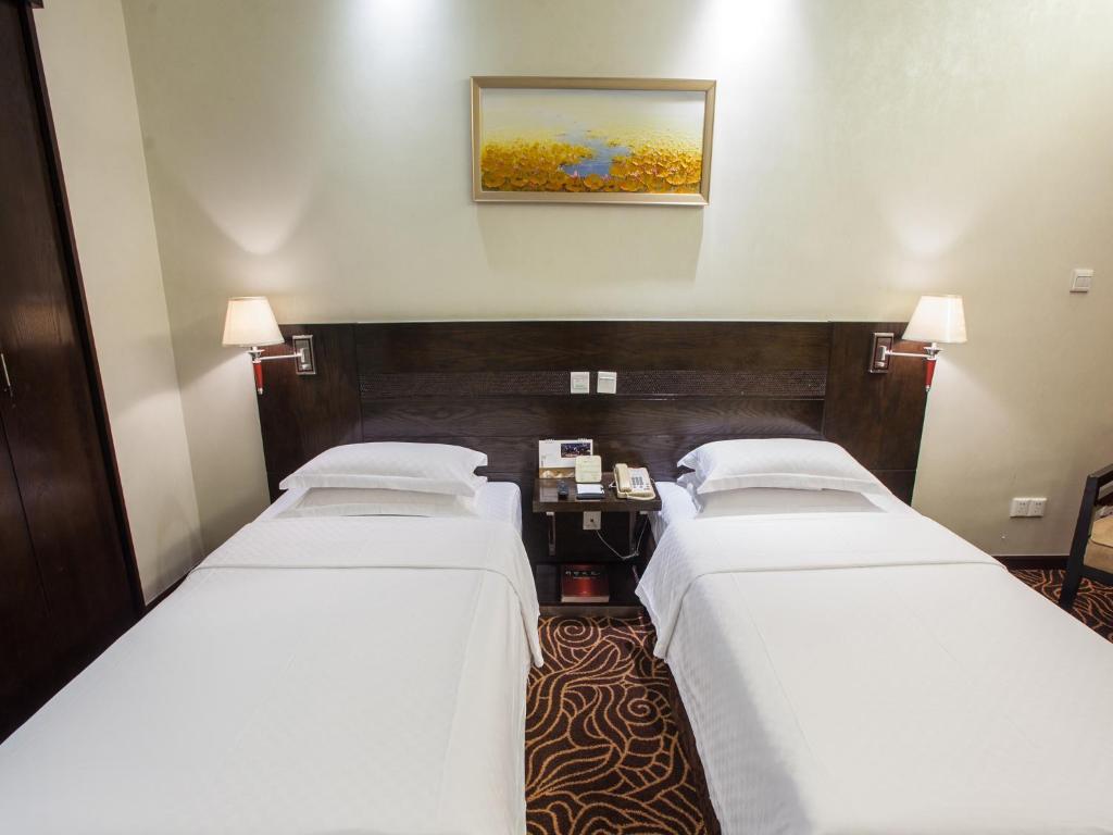 Двухместный (Двухместный номер бизнес-класса с 2 отдельными кроватями) отеля Hua Shi Hotel, Гуанчжоу
