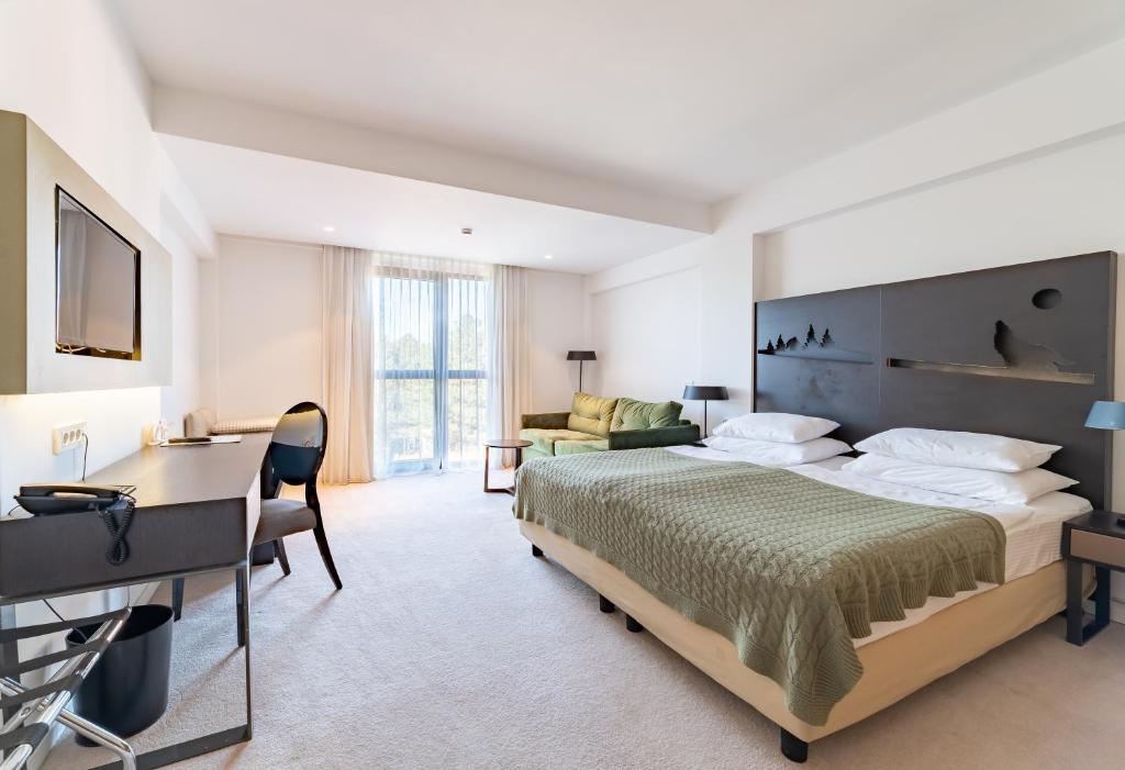 Двухместный (Улучшенный двухместный номер с 1 кроватью или 2 отдельными кроватями) отеля Hotel Palisad, Златибор