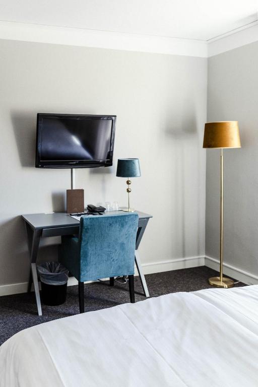 Двухместный (Улучшенный двухместный номер с 1 кроватью или 2 отдельными кроватями) отеля Piteå Stadshotell, Питео