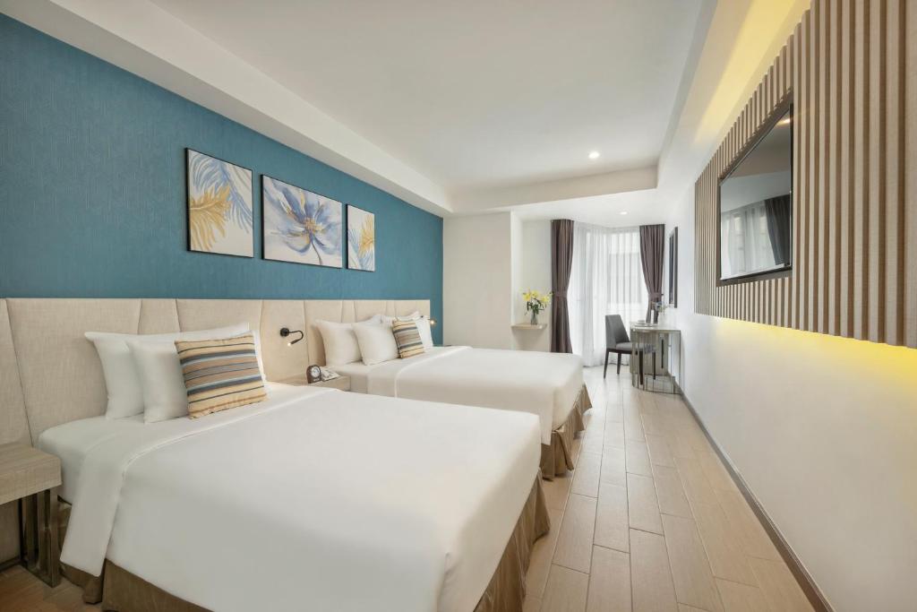 Трехместный (Трехместный номер Делюкс с ванной и видом на город) отеля Atlantic Nha Trang Hotel, Нячанг