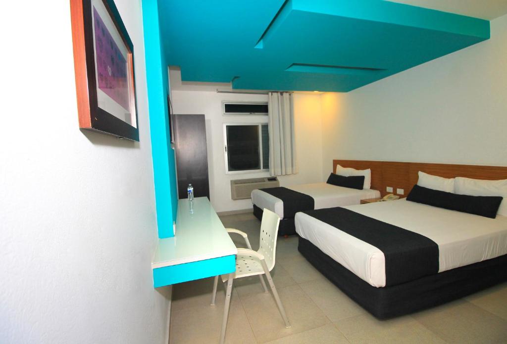 Двухместный (Двухместный номер с 2 двуспальными кроватями) отеля Nu Hotel, Веракрус