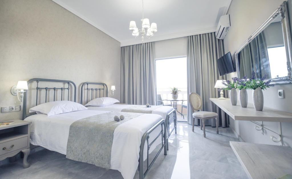 Двухместный (Двухместный номер Делюкс с 2 отдельными кроватями и боковым видом на море) отеля Erofili Hotel, Кавос