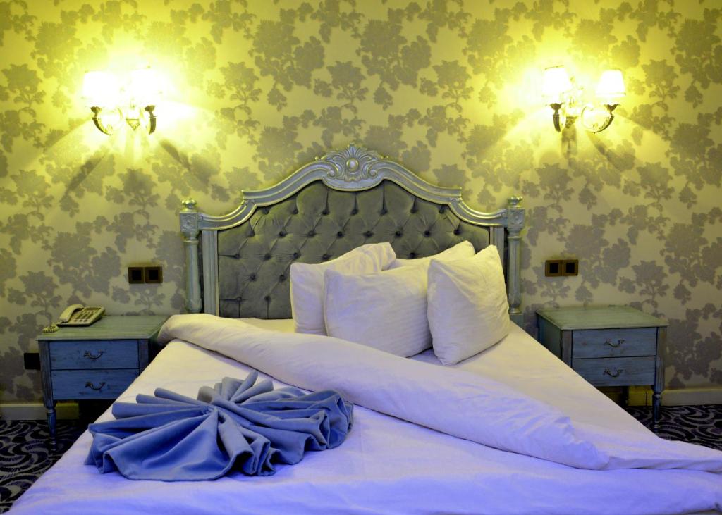 Двухместный (Двухместный номер Делюкс с 1 кроватью или 2 отдельными кроватями) отеля Deluks Hotel Ganja, Гянджа