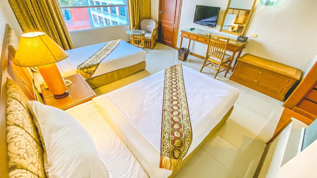 Двухместный (Двухместный номер Делюкс с 1 кроватью или 2 отдельными кроватями) отеля K Park, Сураттхани