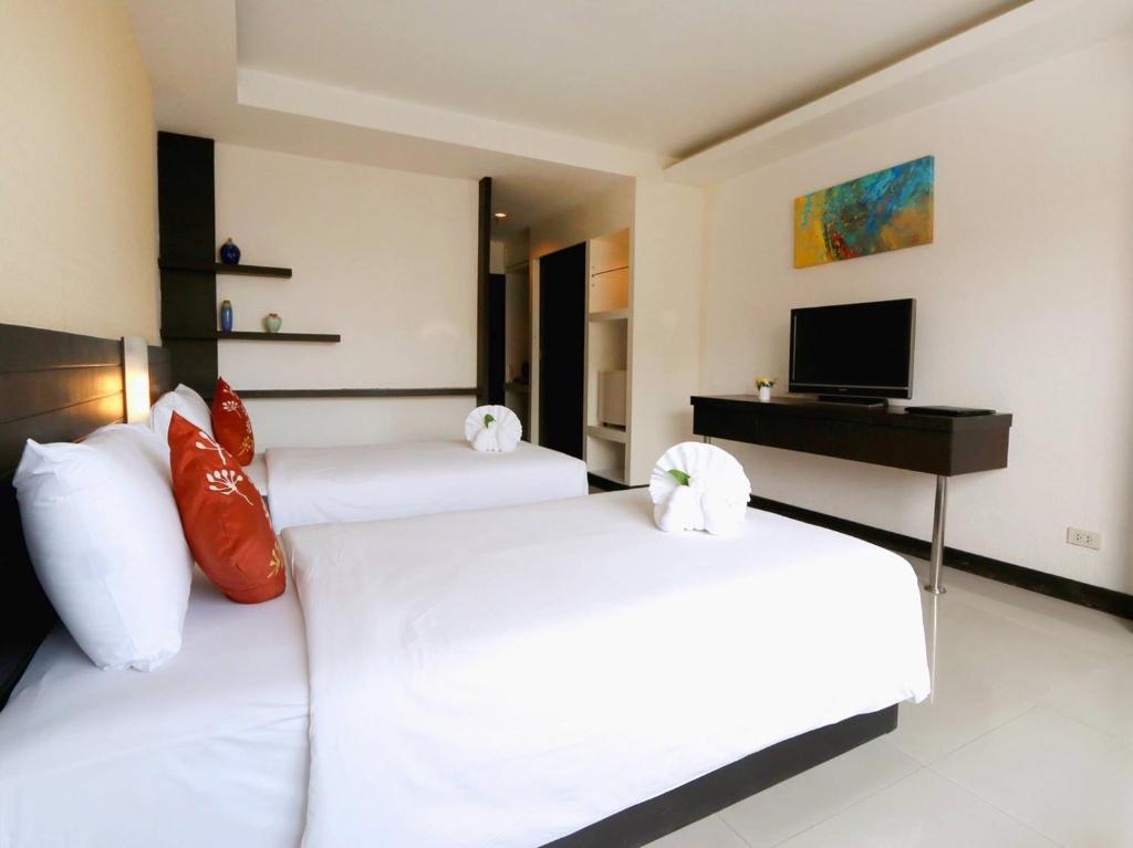 Двухместный (Улучшенный двухместный номер с 2 отдельными кроватями) отеля Baron Beach, Паттайя