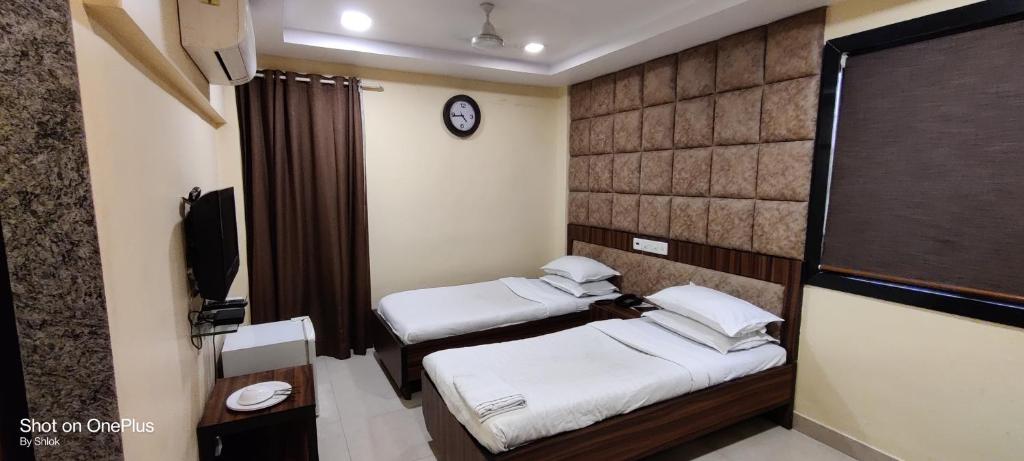 Двухместный (Представительский двухместный номер с 1 кроватью или 2 отдельными кроватями) отеля Hotel Metro Palace, Мумбай