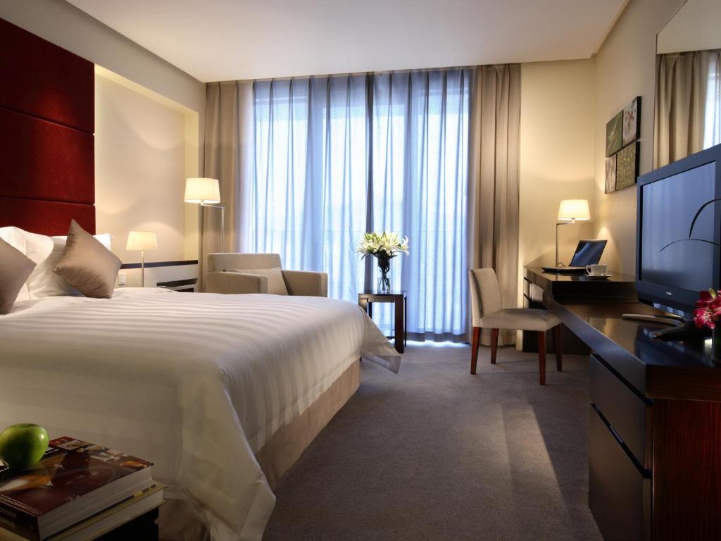 Двухместный (Номер Делюкс с кроватью размера «king-size») отеля Howard Johnson Parkland Hotel Dalian, Далянь