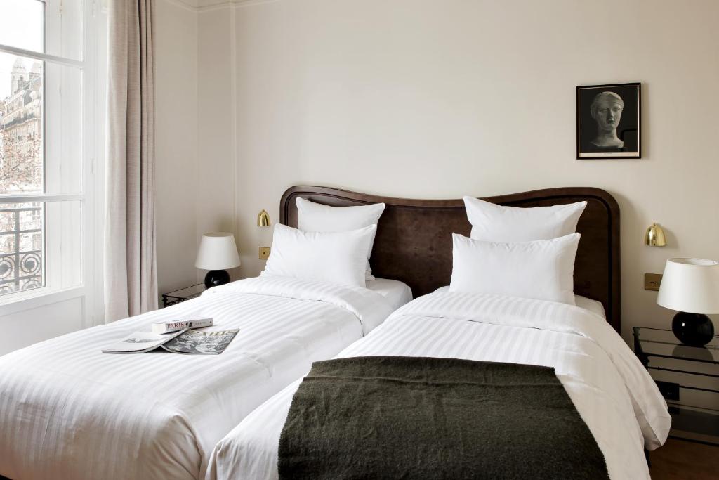 Двухместный (Классический двухместный номер с 2 отдельными кроватями) отеля Hotel Carlton's Montmartre, Париж