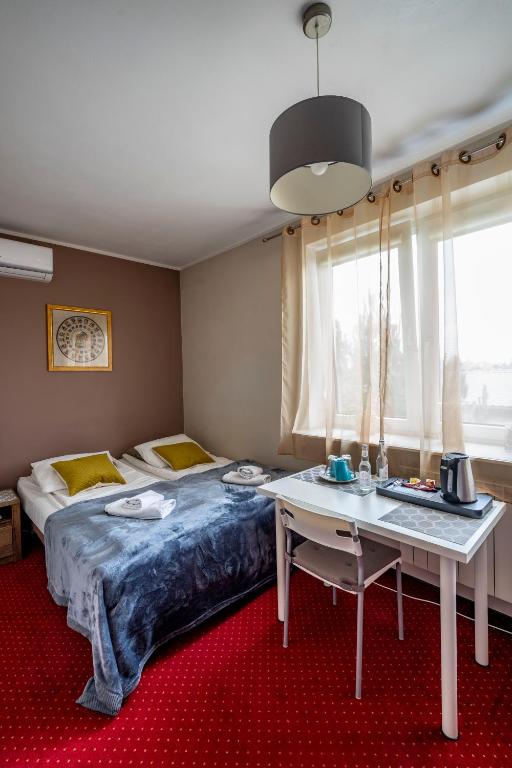 Двухместный (Двухместный номер с 1 кроватью или 2 отдельными кроватями) семейного отеля Villa Kava, Варшава