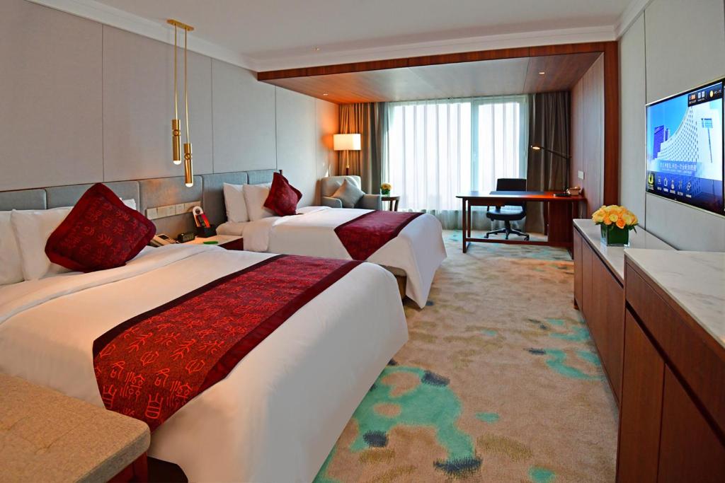 Двухместный (Представительский улучшенный двухместный номер с 1 кроватью или 2 отдельными кроватями) отеля V-Continent Wuzhou Hotel, Пекин