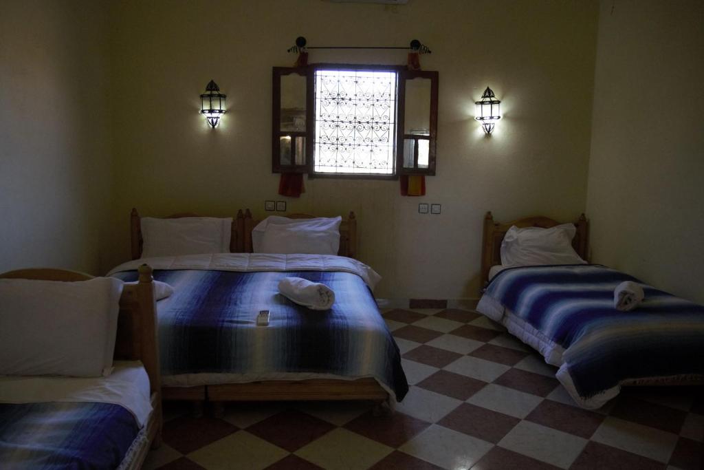Двухместный (Двухместный номер с 1 кроватью или 2 отдельными кроватями) отеля Auberge La Source, Мерзуга