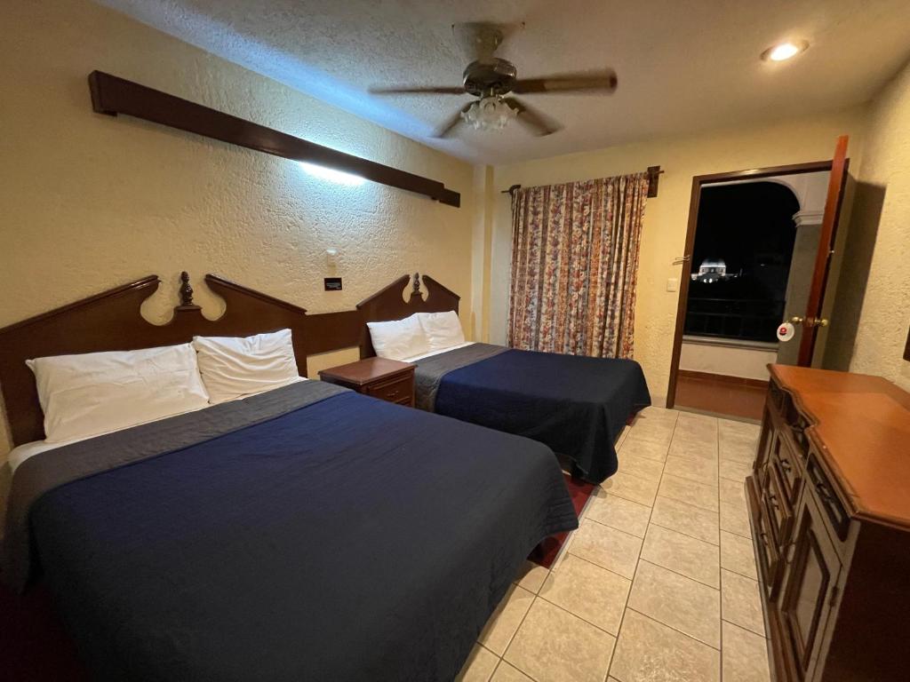 Двухместный (Двухместный номер с 2 отдельными кроватями) отеля Hotel Boutique Tehuacan, Теуакан