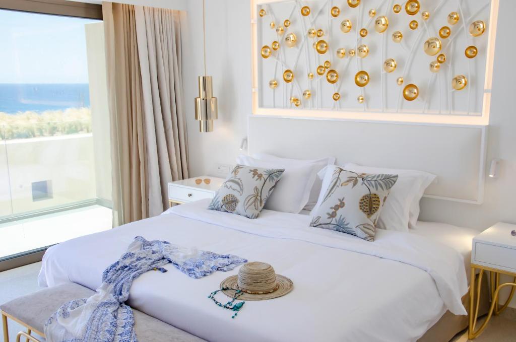 Сьюит (Улучшенный люкс с видом на море) курортного отеля Robinson Club Ierapetra, Кутсунари