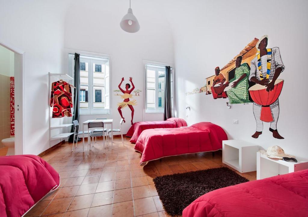 Двухместный (Улучшенный двухместный номер с 2 отдельными кроватями) хостела A casa di Amici, Палермо