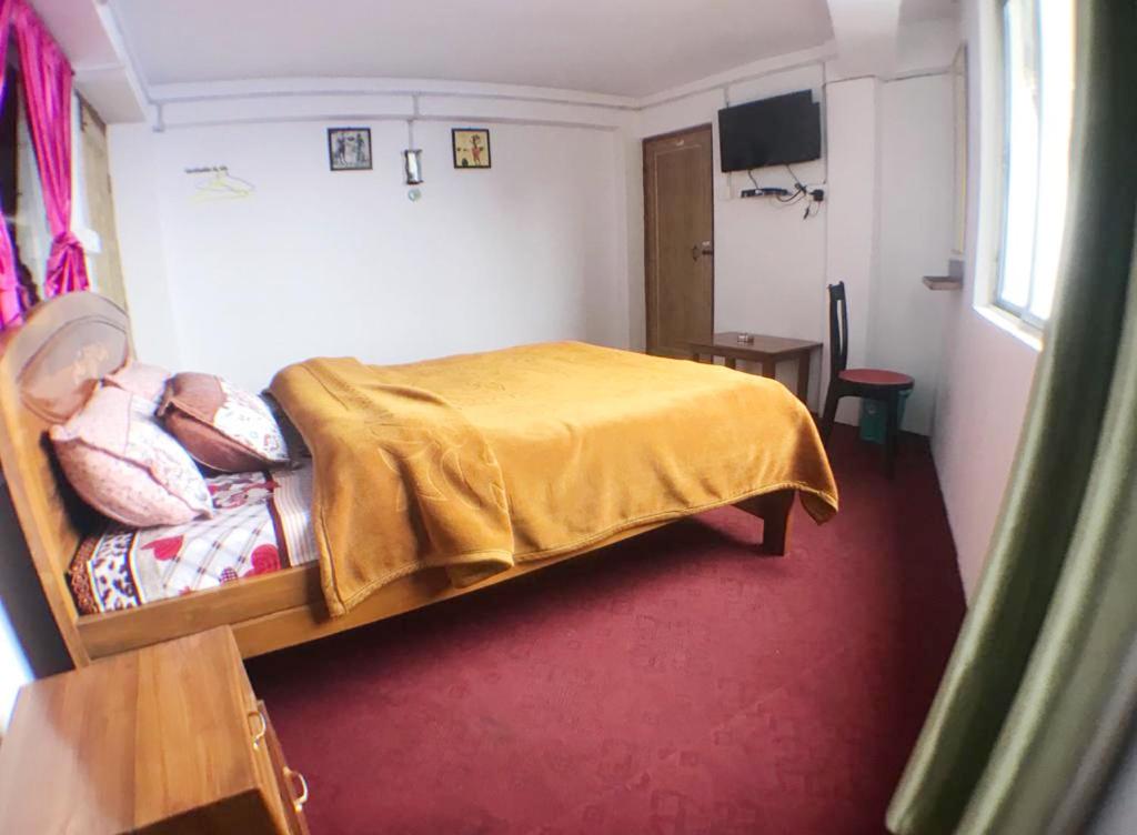 Двухместный (Двухместный номер с 1 кроватью и собственной ванной комнатой) отеля khangsangma guest house, Дарджилинг
