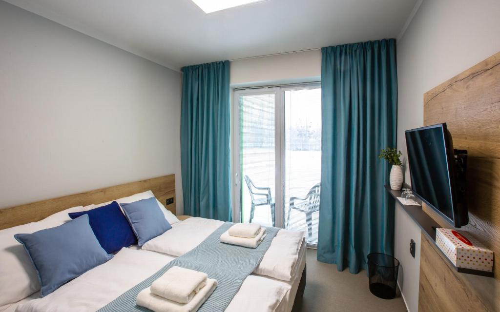 Двухместный (Двухместный номер с 1 кроватью или 2 отдельными кроватями и балконом) гостевого дома Penzion Start Ostrava, Острава