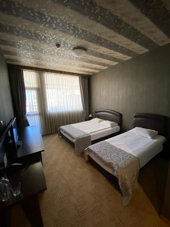 Двухместный (Двухместный номер с 2 отдельными кроватями и балконом) отеля Hotel Aqualand, Пловдив
