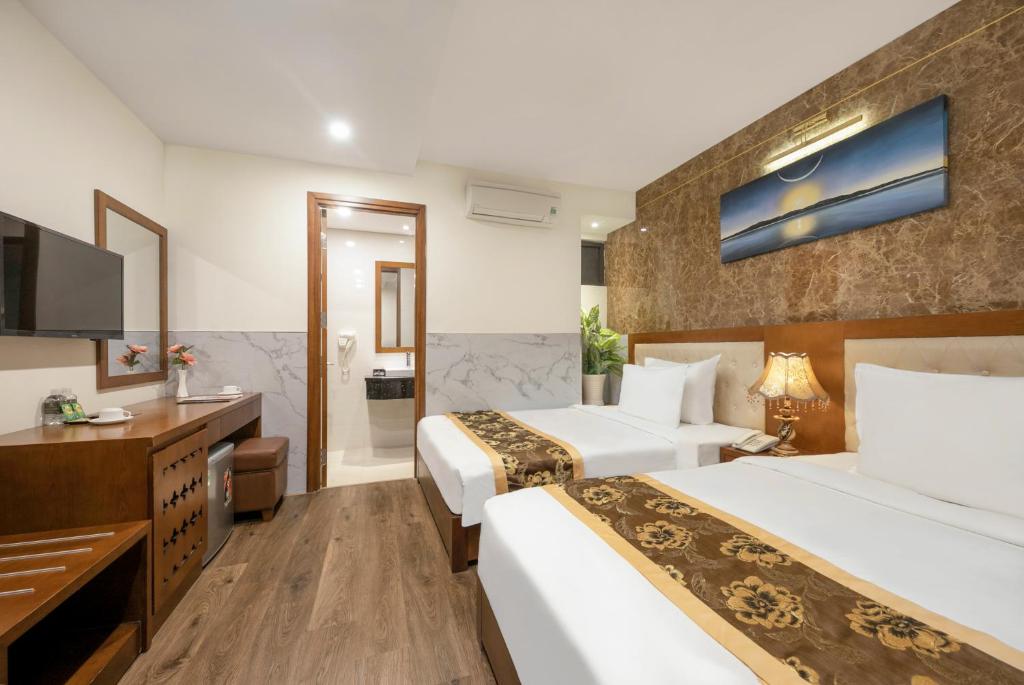 Двухместный (Улучшенный двухместный номер с 2 отдельными кроватями) отеля Hung Anh Hotel, Дананг