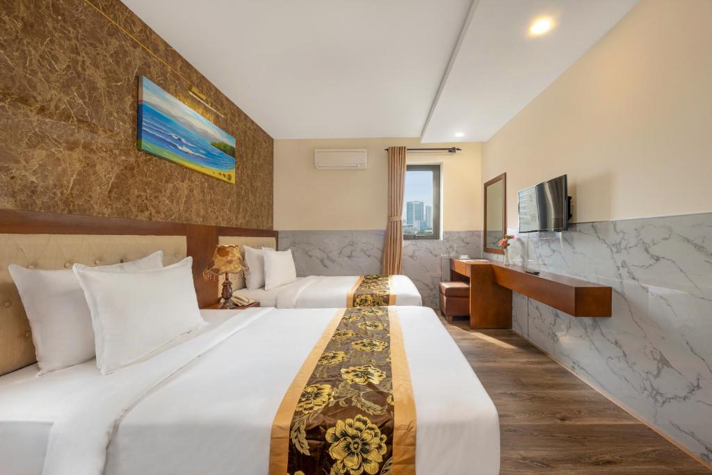 Двухместный (Двухместный номер Делюкс с 2 отдельными кроватями и видом на море) отеля Hung Anh Hotel, Дананг